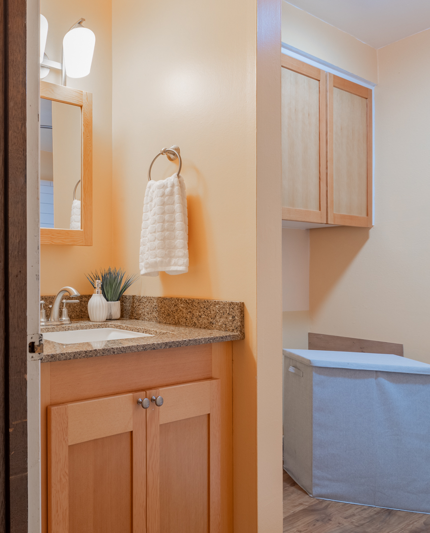 Custom bathroom vanity and laundry cabinet
